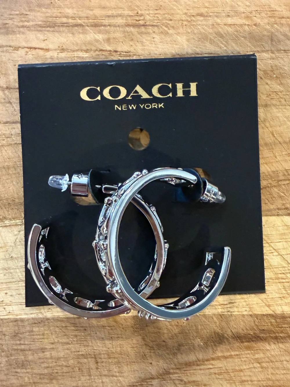 Coach Silver-Tone Cutout Hoop Earrings with Black Interior - Picture 3 of 4
